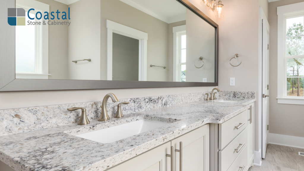 Bathroom vanity countertops in light granite with dual sinks and modern brushed nickel faucets