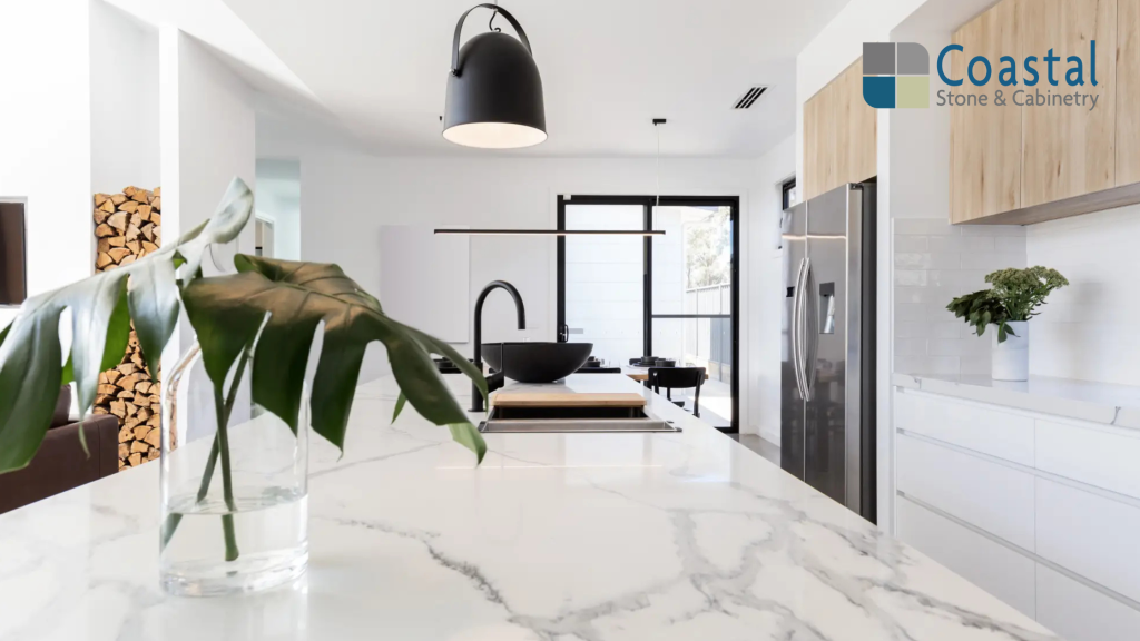 Modern kitchen featuring stone countertops with granite and marble surfaces