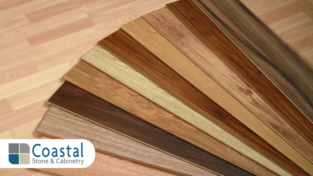 Coastal Stone and Cabinetry luxury vinyl plank flooring samples in a wide array of natural wood grain stains and finishes for coastal homes in Baldwin County.